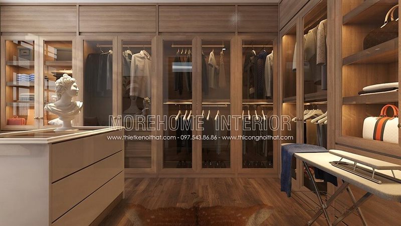 . Mẫu tủ quần áo âm tường được làm bằng kính và gỗ tự nhiên, có gam màu nâu sang trọng, quý phái.